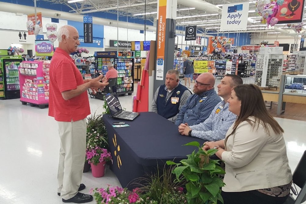 Surrounded by customers shopping in a Springfield Walmart, The Door Balancer developer Robert Vavrinak pitches his product to local managers for Open Call.